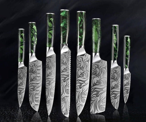 Japanese chef knife set forged from 67-layer Damascus steel with razor sharp blades and traditional ergonomic handles

