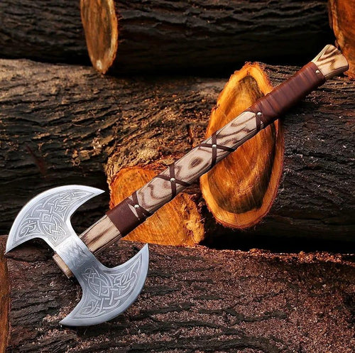 A double-headed axe with a silver blade and brown wooden handle, placed against a background of cut wood.