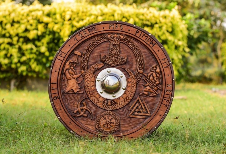 Handmade wooden Viking shield with engraved Norse design, medieval round shield for decor and cosplay by Viking Hills
