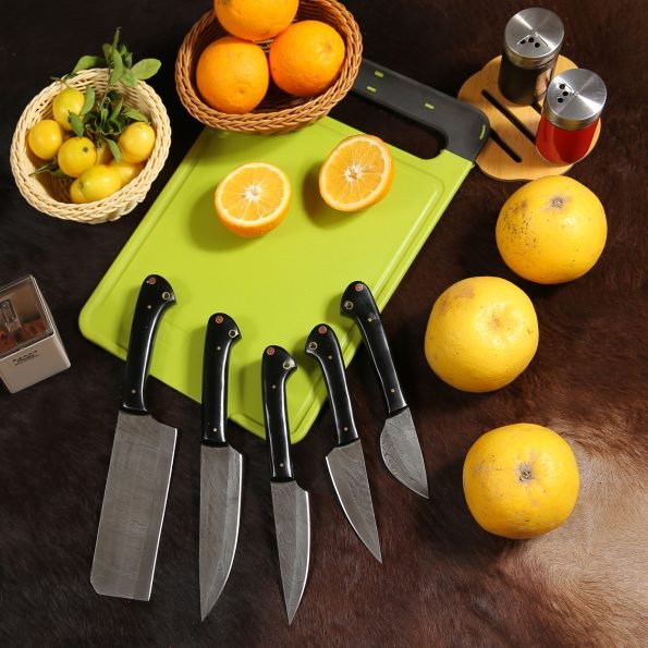 Damascus 5-piece chef knife set with patterned steel blades and ergonomic handles for professional kitchen use by Viking Hills
