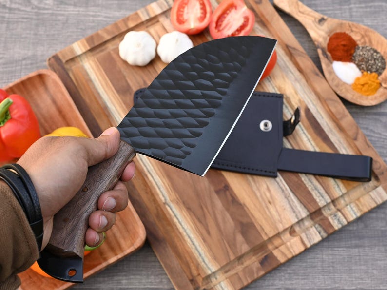 Fully handmade cleaver knife with sharp high carbon steel blade and strong full tang design for heavy duty use

