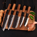 forges steel 5-piece chef knife set with patterned steel blades and ergonomic handles for professional kitchen use by Viking Hills
