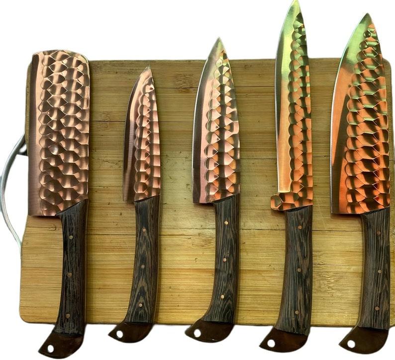 forged steel 5-piece chef knife set with patterned steel blades and ergonomic handles for professional kitchen use by Viking Hills
