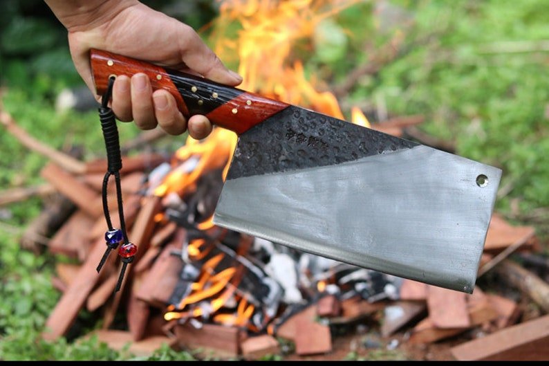 Fully handmade cleaver knife with sharp high carbon steel blade and strong full tang design for heavy duty use
