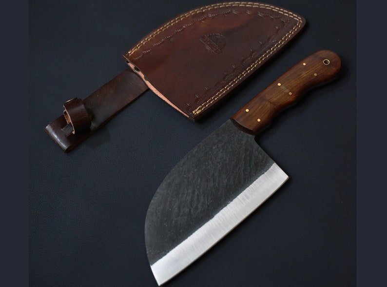 Fully handmade cleaver knife with sharp high carbon steel blade and strong full tang design for heavy duty use
