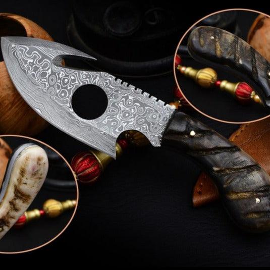 Handmade skinner knife with sharp curved steel blade and ergonomic handle for hunting and skinning tasks
