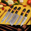 Damascus 5-piece chef knife set with patterned steel blades and ergonomic handles for professional kitchen use by Viking Hills
