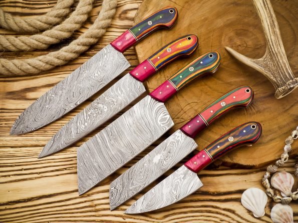 Damascus 5-piece chef knife set with patterned steel blades and ergonomic handles for professional kitchen use by Viking Hills
