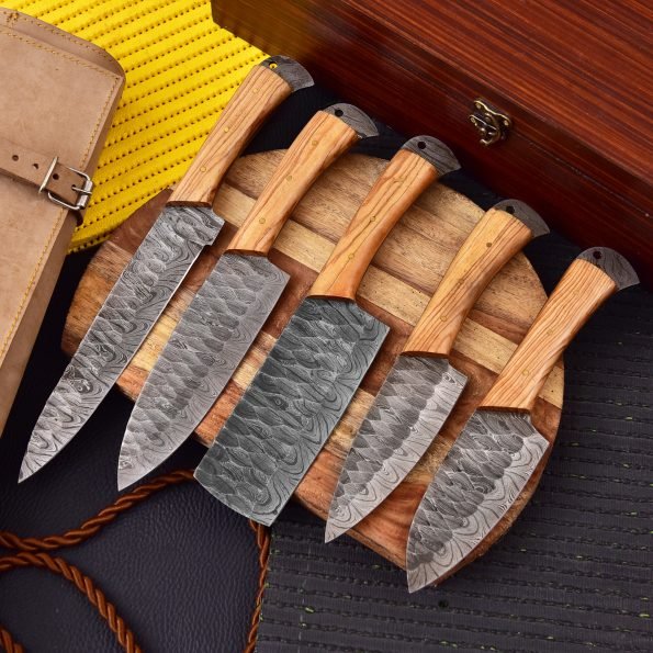 Damascus 5-piece chef knife set with patterned steel blades and ergonomic handles for professional kitchen use by Viking Hills
