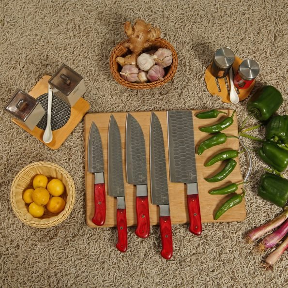 Damascus 5-piece chef knife set with patterned steel blades and ergonomic handles for professional kitchen use by Viking Hills
