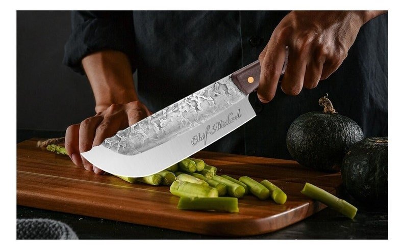 Fully handmade cleaver knife with sharp high carbon steel blade and strong full tang design for heavy duty use
