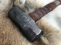 Viking engraved hammer with detailed Norse carvings, handcrafted metal head and wooden handle for decor and cosplay
