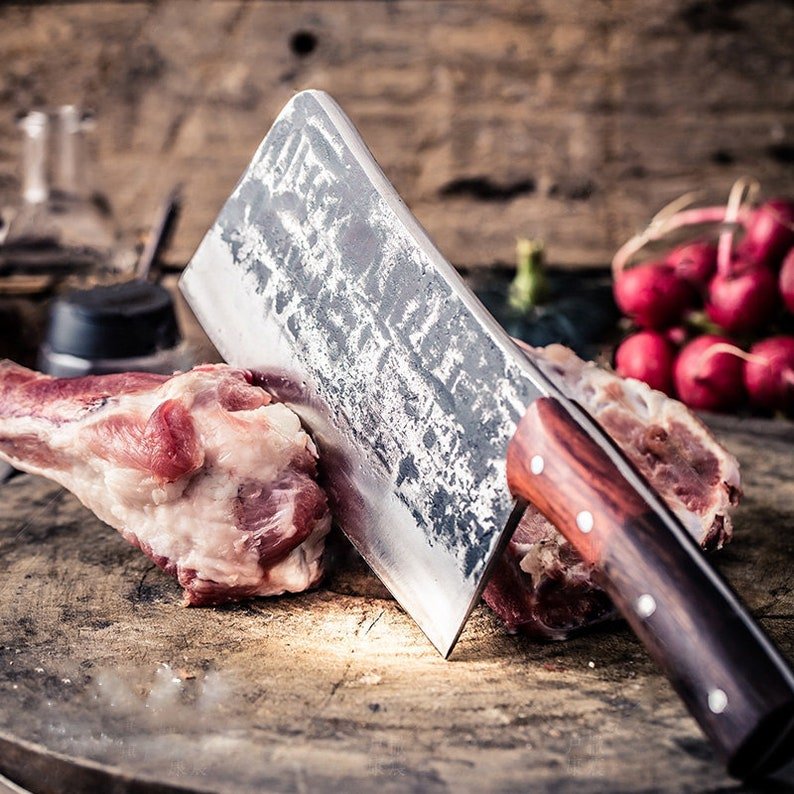 Fully handmade cleaver knife with sharp high carbon steel blade and strong full tang design for heavy duty use
