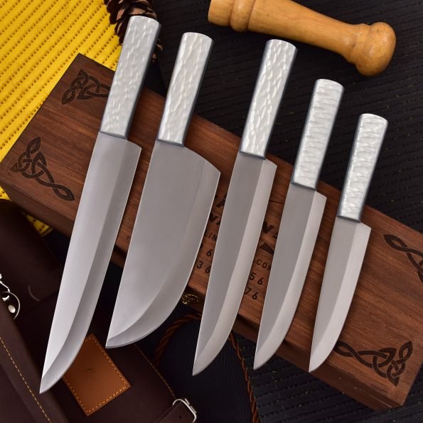 Damascus 5-piece chef knife set with patterned steel blades and ergonomic handles for professional kitchen use by Viking Hills
