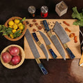 Damascus 5-piece chef knife set with patterned steel blades and ergonomic handles for professional kitchen use by Viking Hills
