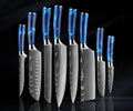 Japanese chef knife set forged from 67-layer Damascus steel with razor sharp blades and traditional ergonomic handles
